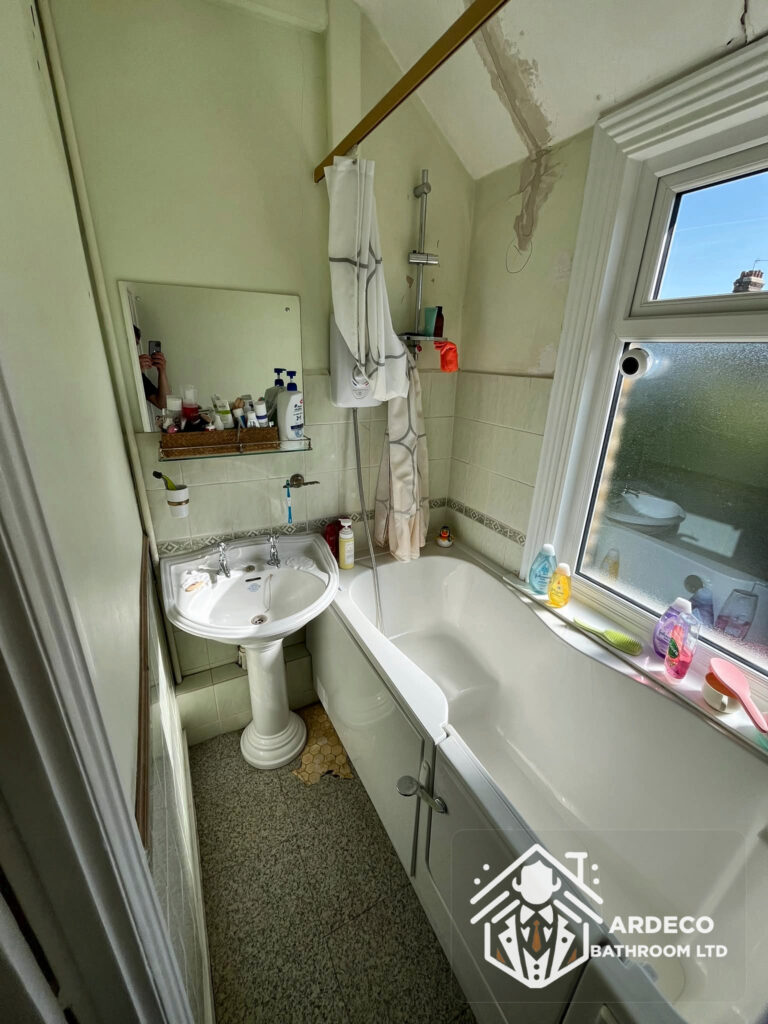 Before renovation – separate bathroom Separate bathroom with bath and basin before the Northfields, Ealing renovation