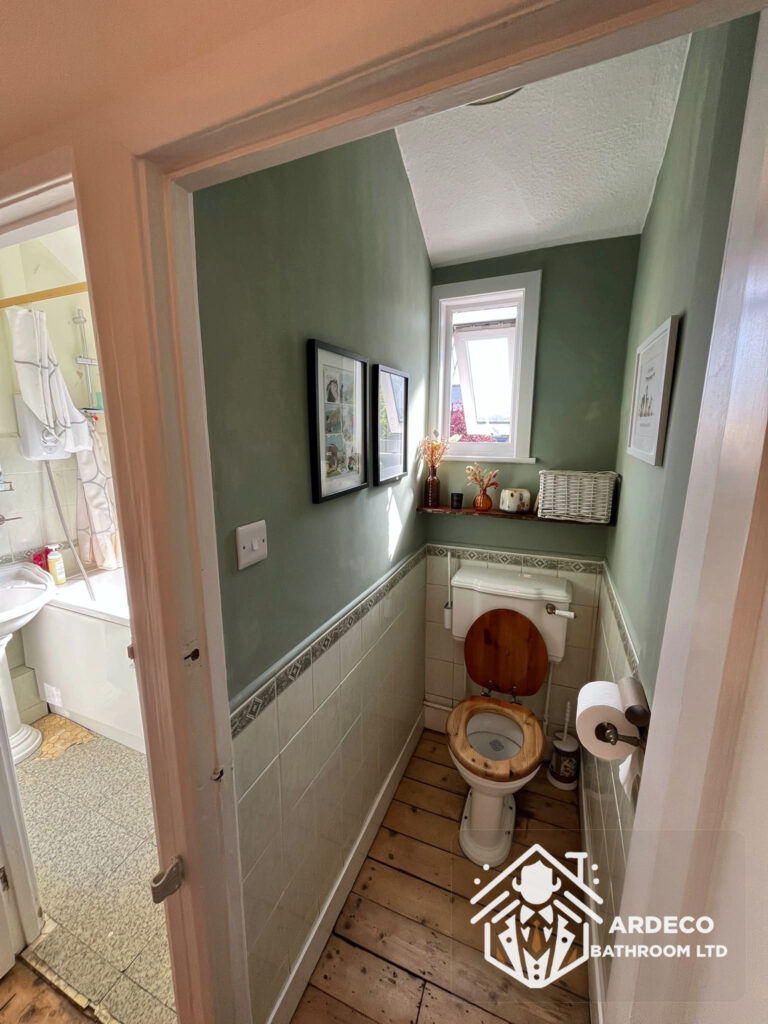 Before renovation – separate WC Original separate WC with timber flooring before the bathroom conversion